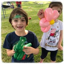 balloon twisting, balloon, balloon animal, birthday party, dinosaur, flower
