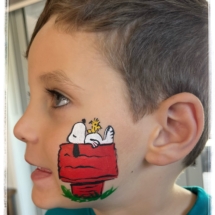 snoopy face paint for a boy on a party in Tauranga