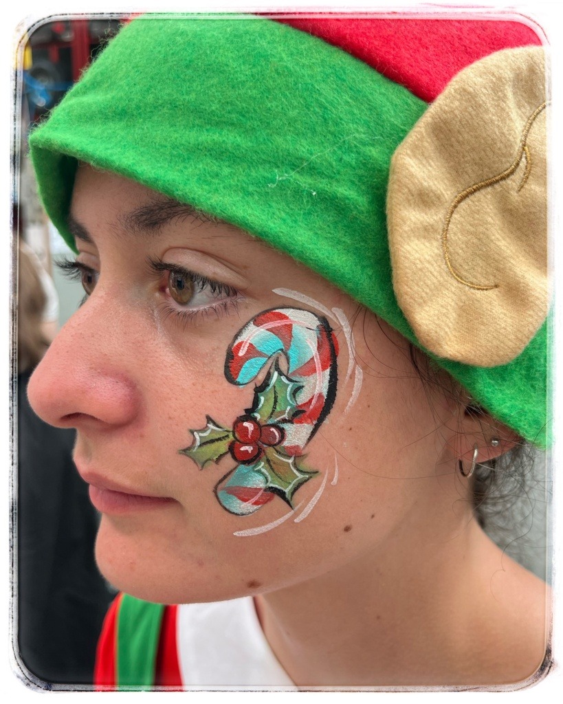 Xmas candy cane face painting at Mitre 10 store