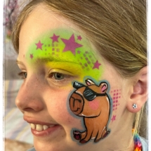 Capibara face painting on the birthday gir Capibara face painting on the birthday gir
